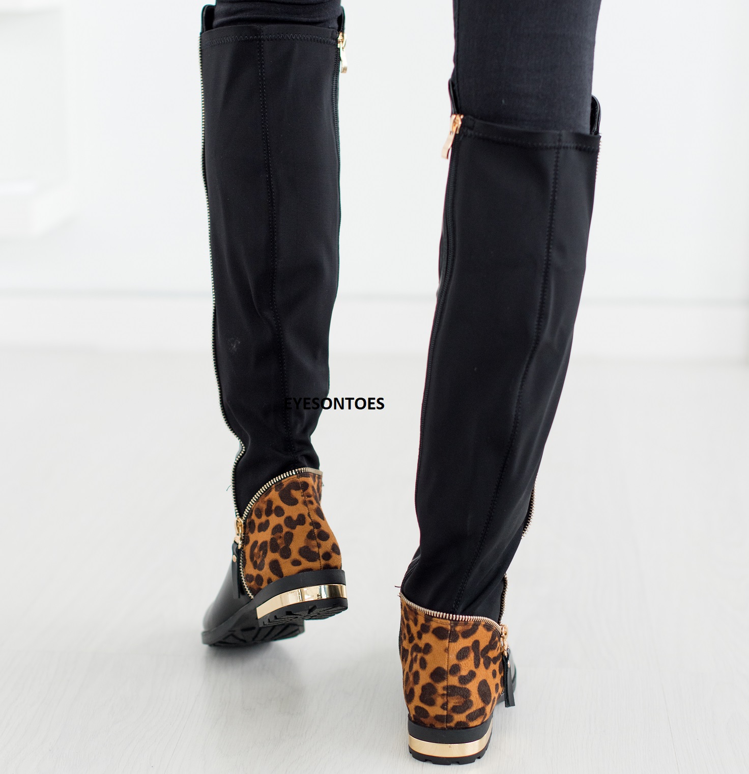 knee high boots with gold trim